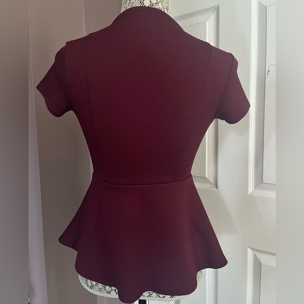 Dynamite Peplum Top - Picture 2 of 3